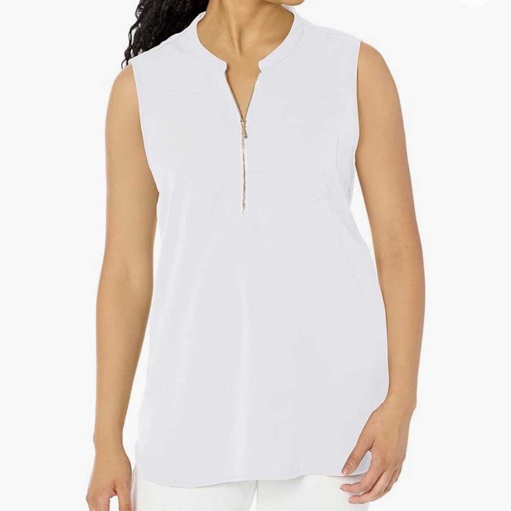 White sleeveless blouse with gold zipper front